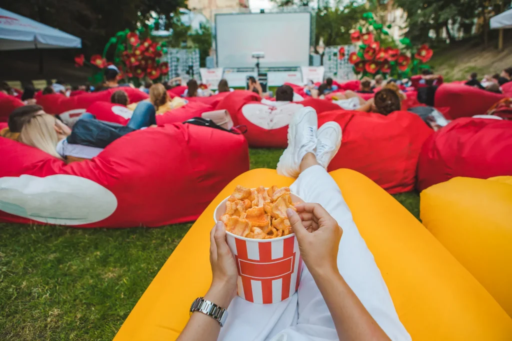 The adults celebrate the summer outdoor movie night